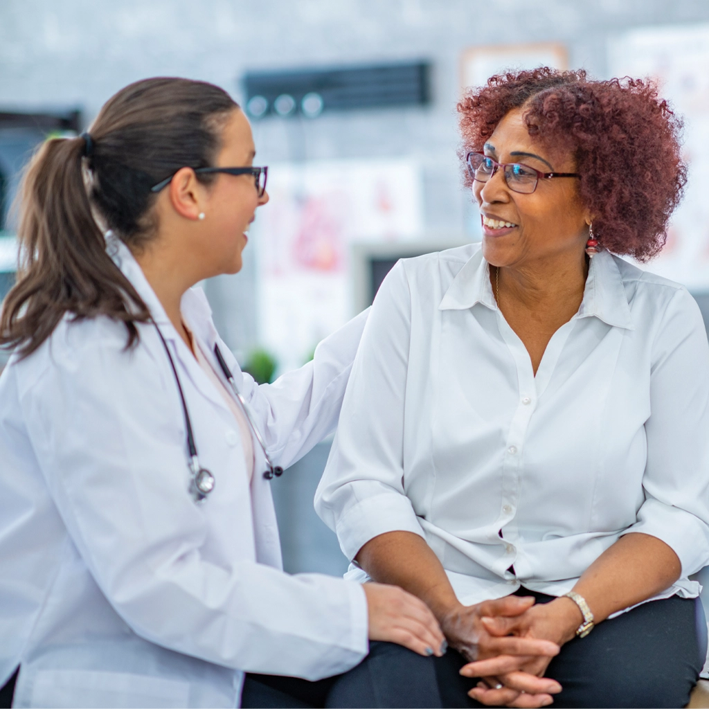 woman with doctor discussing port placement